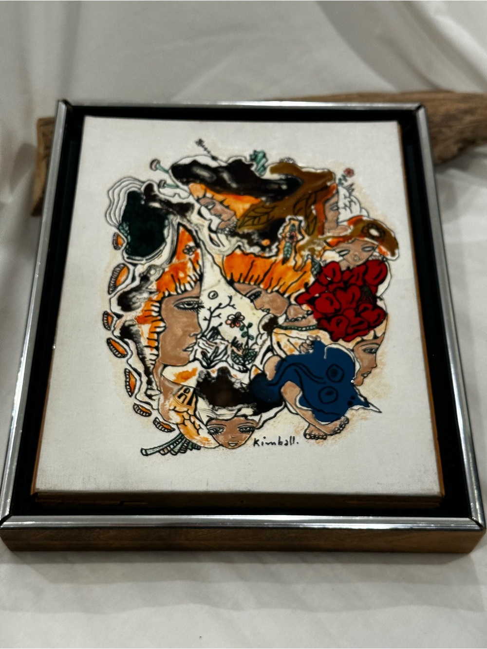 Kimball's surrealist compositions  blend human figures with, organic shapes.
